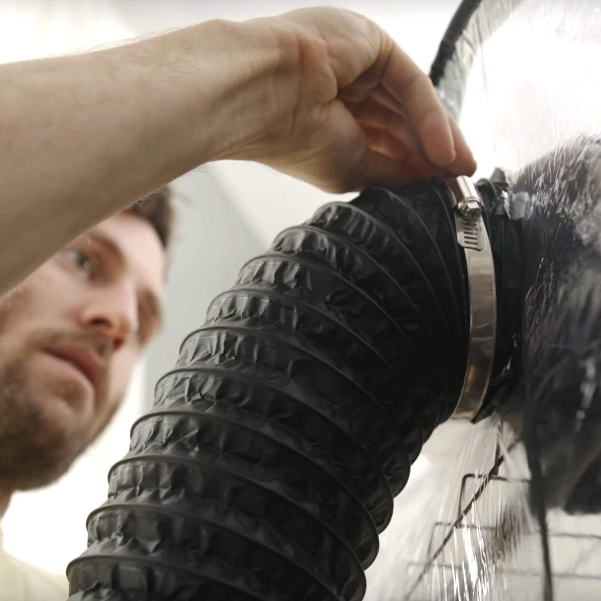 Clamping flexible ducting to BoomRoom mushroom grow tent to vent spores