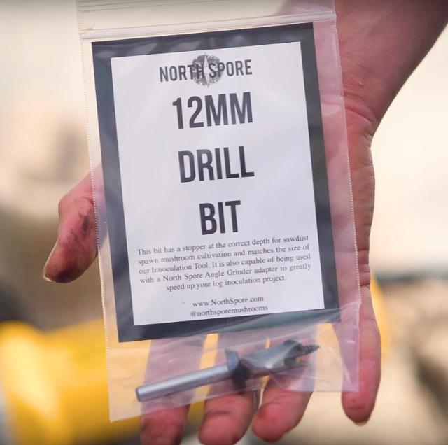 A 12MM log drill bit in a plastic bag